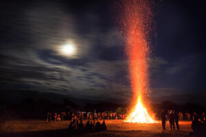 A huge bonfire at a midsummer festival.