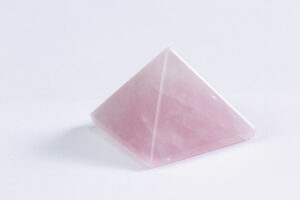 A rose quartz pyramid.