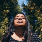 Woman Exposing Face To Sunlight For Vitamin D