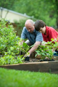 A family gardens in their backyard to aid their community.