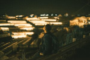 A wanderer in a cityscape.