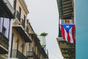 Puerto Rican flag waving in the streets of San Juan, where my familial traditions began.