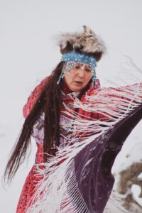 a traditional Native American dancer while from Barrow, Alaska